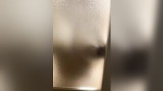 Masturbation by rubbing her nipple against the window - 4 image