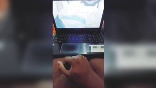 Jerking off by watching Hentai porn video.